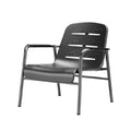 Moderne metalen fauteuil met perforaties en armleuningen
